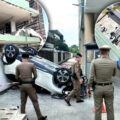 An old man smashes EV car through a car park wall and tumbles to the ground wheel up on Monday. Survives