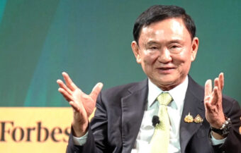 Thaksin calls for more cash flow and predicts a realignment of the world financial system in 5 years